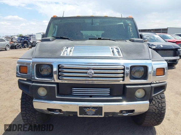 2003 Hummer H2 with VIN 5GRGN23U73H122756, listed as a IAAI auction lot 42194176 with 239,411 mi miles. Bid and sale history available at carsss.com. Image 12.