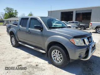 2016 Nissan Frontier SV with VIN 1N6AD0EV0GN790634, listed as a Copart auction lot 52742205 with 190,956 mi miles and Salvage title. Bid and sale history available at DreamBid. Image 4.