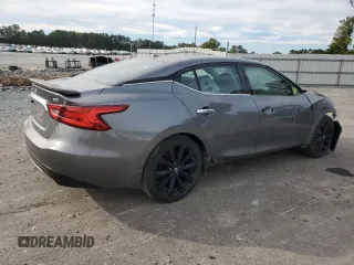 2017 Nissan Maxima Platinum with VIN 1N4AA6AP2HC415210, listed as a Copart auction lot 75491674 with 107,023 mi miles and Salvage title. Bid and sale history available at DreamBid. Image 3.