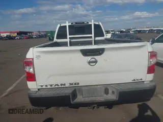 2019 Nissan Titan with VIN 1N6BA1RP0KN523792, listed as a IAAI auction lot 41367790 with 101,426 mi miles and . Bid and sale history available at DreamBid. Image 16.