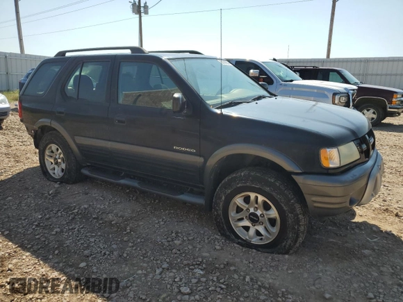 2003 Isuzu Rodeo with VIN 4S2CK58W634313617, listed as a Copart auction lot 70144664 with 179,921 mi miles and Clean Title. Bid and sale history available at DreamBid. Image 4.