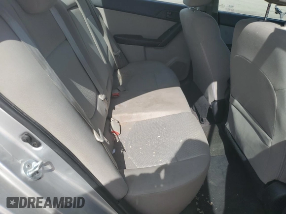 2010 Kia Forte EX z VIN KNAFU4A22A5828445, wystawiony jako Copart lot #51564313 z przebiegiem 114 961 mil mil oraz Szkoda całkowita • Salvage title. Historia ofert i sprzedaży dostępna na DreamBid. Obrazek 10.