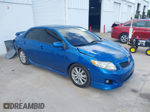 2009 Toyota Corolla with VIN 2T1BU40E69C154781, listed as a IAAI auction lot 42009936 with 180,039 mi miles. Bid and sale history available at carsss.com. Image 1.