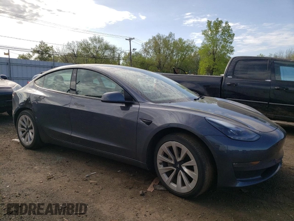 2022 Tesla Model 3 Long Range z VIN 5YJ3E1EB6NF290946, wystawiony jako Copart lot #54937825 z przebiegiem 111 044 mil mil oraz Szkoda całkowita • Salvage title. Historia ofert i sprzedaży dostępna na DreamBid. Obrazek 4.