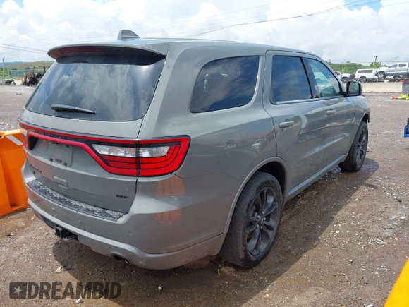 2022 Dodge Durango GT Plus with VIN 1C4RDJDG1NC213263, listed as a IAAI auction lot 42639103 with 77,061 mi miles and . Bid and sale history available at DreamBid. Image 4.