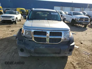 2008 Dodge Nitro SXT z VIN 1D8GU28K98W138540, wystawiony jako Copart lot #53465375 z przebiegiem 92 842 mil mil oraz Czysty tytuł • Clean title. Historia ofert i sprzedaży dostępna na DreamBid. Obrazek 5.