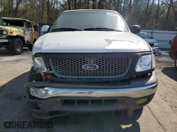 2002 Ford F-150 XLT with VIN 1FTRW07L32KE29159, listed as a Copart auction lot 50596125 with 198,058 mi miles and Salvage Title. Bid and sale history available at carsss.com. Image 5.