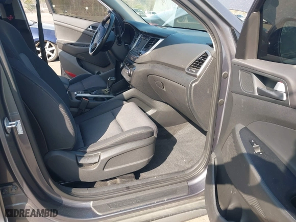 2017 Hyundai Tucson Value with VIN KM8J33A24HU281183, listed as a IAAI auction lot 41563886 with 71,110 mi miles. Bid and sale history available at carsss.com. Image 5.