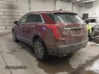 2017 Cadillac XT5 Luxury AWD with VIN 1GYKNDRS4HZ257413, listed as a IAAI auction lot 41537197 with 124,184 mi miles and . Bid and sale history available at DreamBid. Image 3.