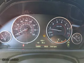 2015 BMW 4 Series 428i xDrive with VIN WBA4C9C51FD331771, listed as a Copart auction lot 82763504 with 124,945 mi miles and Salvage Title. Bid and sale history available at carsss.com. Image 9.