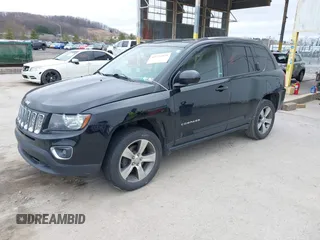 2016 Jeep Compass Latitude with VIN 1C4NJDEB8GD695268, listed as a IAAI auction lot 41724921 with 137,118 mi miles. Bid and sale history available at carsss.com. Image 17.