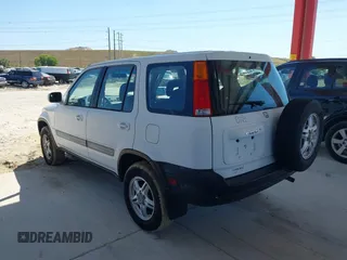 1999 Honda CR-V EX with VIN JHLRD1860XC037846, listed as a IAAI auction lot 42037921 with 164,477 mi miles. Bid and sale history available at carsss.com. Image 3.