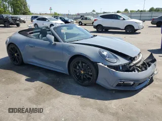 2023 Porsche 911 Carrera with VIN WP0CA2A9XPS238259, listed as a Copart auction lot 53636345 with 14,328 mi miles and Salvage title. Bid and sale history available at DreamBid. Image 4.