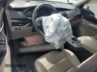 2021 Cadillac XT4 FWD Premium Luxury z VIN 1GYFZCR40MF000293, wystawiony jako Copart lot #58710565 z przebiegiem 49 721 mil mil oraz Szkody całkowita. Historia ofert i sprzedaży dostępna na DreamBid. Obrazek 8.