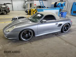 2003 Porsche Boxster z VIN WP0CA29863U624834, wystawiony jako Copart lot #59116125 z przebiegiem Nie podano mil oraz Czysty tytuł • Clean title. Historia ofert i sprzedaży dostępna na DreamBid. Obrazek 1.