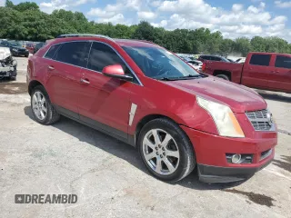 2012 Cadillac SRX Performance Collection with VIN 3GYFNBE39CS655341, listed as a Copart auction lot 62350625 with 156,043 mi miles and Salvage title. Bid and sale history available at DreamBid. Image 4.