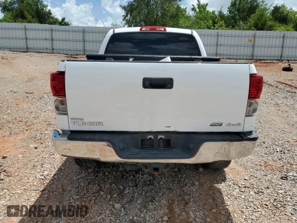 2013 Toyota Tundra с VIN 5TFDW5F18DX280681, выставлен на аукционе Copart как лот 61423235 с пробегом 273 322 миль миль и Чистый • Clean title. История ставок и продаж доступна на DreamBid. Изображение 6.