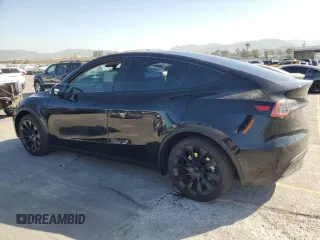 2024 Tesla Model Y Long Range с VIN 7SAYGDEE8RA231933, выставлен на аукционе Copart как лот 58078115 с пробегом 14 959 миль миль и Списание • Salvage title. История ставок и продаж доступна на DreamBid. Изображение 2.