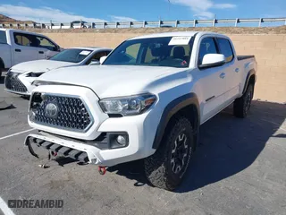 2019 Toyota Tacoma 4WD SR5 with VIN 3TMDZ5BN1KM079305, listed as a IAAI auction lot 41247804 with 98,494 mi miles. Bid and sale history available at carsss.com. Image 17.