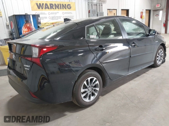 2022 Toyota Prius L Eco with VIN JTDKAMFU2N3186072, listed as a IAAI auction lot 42486252 with 5,887 mi miles and . Bid and sale history available at DreamBid. Image 4.