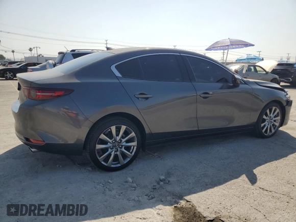 2021 Mazda 3 Premium with VIN JM1BPADL7M1342365, listed as a Copart auction lot 58619075 with 40,556 mi miles and Salvage title. Bid and sale history available at DreamBid. Image 3.