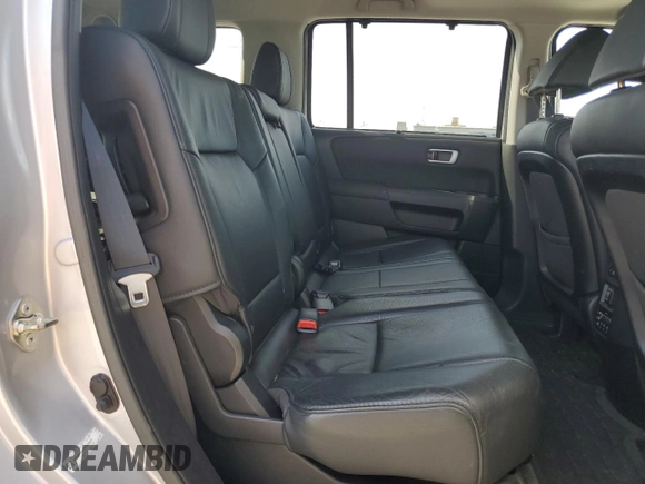 2014 Honda Pilot Touring z VIN 5FNYF4H97EB055677, wystawiony jako Copart lot #55132895 z przebiegiem 83 030 mil mil oraz Szkoda całkowita • Salvage title. Historia ofert i sprzedaży dostępna na DreamBid. Obrazek 11.