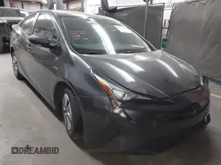 2018 Toyota Prius Two with VIN JTDKARFU6J3553871, listed as a IAAI auction lot 41577636 with 118,715 mi miles. Bid and sale history available at carsss.com. Image 1.