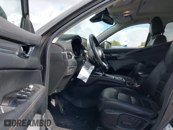2021 Mazda CX-5 Grand Touring with VIN JM3KFADM2M1340669, listed as a IAAI auction lot 41916687 with 83,872 mi miles. Bid and sale history available at carsss.com. Image 5.