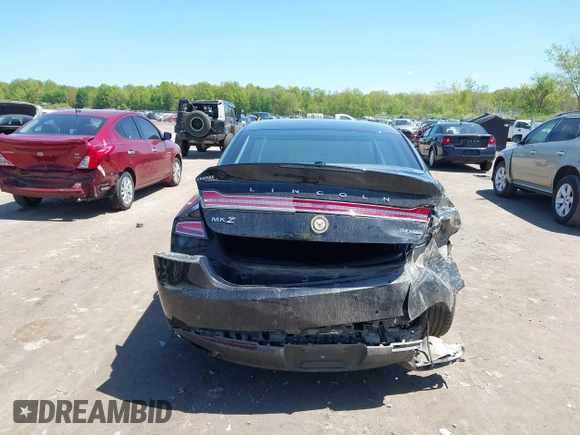 2015 Lincoln MKZ with VIN 3LN6L2J96FR625761, listed as a IAAI auction lot 42235387 with 132,183 mi miles and . Bid and sale history available at DreamBid. Image 6.
