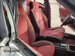1990 Plymouth Sundance z VIN 1P3XP48K4LN160672, wystawiony jako Copart lot #71204364 z przebiegiem 81 706 mil mil oraz Szkody całkowita. Historia ofert i sprzedaży dostępna na DreamBid. Obrazek 10.