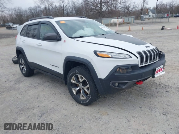 2015 Jeep Cherokee Trailhawk with VIN 1C4PJMBB7FW741365, listed as a IAAI auction lot 41879685 with 94,135 mi miles and . Bid and sale history available at carsss.com. Image 1.