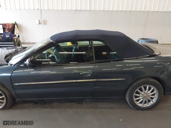 2002 Chrysler Sebring Limited with VIN 1C3EL65R92N272242, listed as a IAAI auction lot 41164755 with 52,086 mi miles. Bid and sale history available at carsss.com. Image 14.