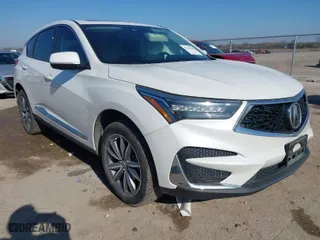 2020 Acura RDX w/Technology Pkg with VIN 5J8TC1H59LL011089, listed as a IAAI auction lot 41246036 with 66,261 mi miles. Bid and sale history available at carsss.com. Image 1.