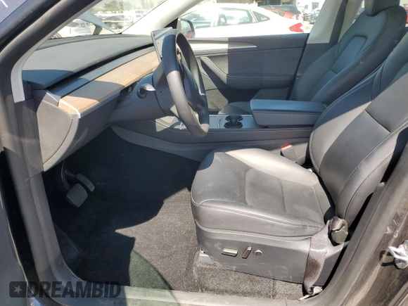 2024 Tesla Model Y Long Range z VIN 7SAYGDEE5RA244641, wystawiony jako Copart lot #51864845 z przebiegiem 23 096 mil mil oraz Szkoda całkowita • Salvage title. Historia ofert i sprzedaży dostępna na DreamBid. Obrazek 7.