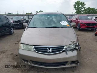 2003 Honda Odyssey EX-L z VIN 5FNRL18063B135949, wystawiony jako IAAI lot #42248105 z przebiegiem 210 567 mil mil oraz . Historia ofert i sprzedaży dostępna na DreamBid. Obrazek 12.