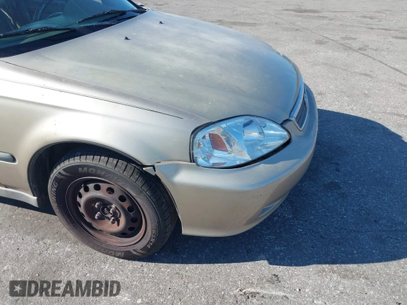 2000 Honda Civic LX with VIN 1HGEJ6577YL022486, listed as a IAAI auction lot 41786438 with 173,488 mi miles and . Bid and sale history available at DreamBid. Image 12.