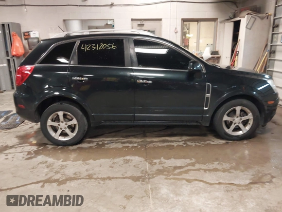 2014 Chevrolet Captiva Sport LT z VIN 3GNAL3EK7ES503622, wystawiony jako IAAI lot #42312056 z przebiegiem 122 966 mil mil oraz . Historia ofert i sprzedaży dostępna na DreamBid. Obrazek 13.