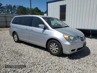 2010 Honda Odyssey EX with VIN 5FNRL3H43AB029325, listed as a Copart auction lot 52177995 with 183,345 mi miles and Salvage Title. Bid and sale history available at DreamBid. Image 4.