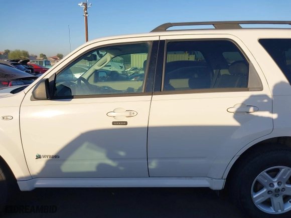 2009 Mercury Mariner Hybrid with VIN 4M2CU29399KJ05674, listed as a IAAI auction lot 40843807 with 194,987 mi miles. Bid and sale history available at carsss.com. Image 15.