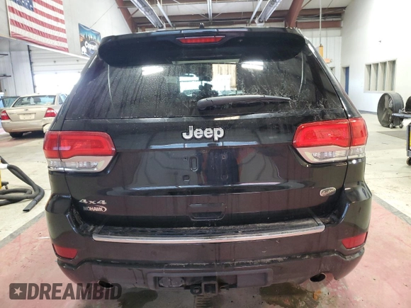 2020 Jeep Grand Cherokee Overland with VIN 1C4RJFCG0LC136132, listed as a Copart auction lot 45793435 with 66,491 mi miles and Salvage Title. Bid and sale history available at DreamBid. Image 6.