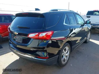 2018 Chevrolet Equinox Premier with VIN 3GNAXPEU5JL165915, listed as a IAAI auction lot 41597476 with 71,495 mi miles. Bid and sale history available at carsss.com. Image 4.