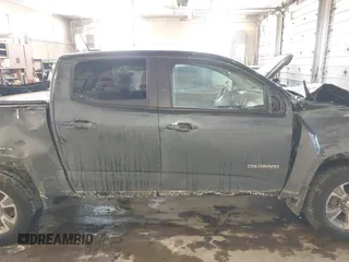 2019 Chevrolet Colorado 4WD Z71 z VIN 1GCGTDEN9K1299292, wystawiony jako IAAI lot #41626944 z przebiegiem 84 949 mil mil oraz . Historia ofert i sprzedaży dostępna na DreamBid. Obrazek 13.