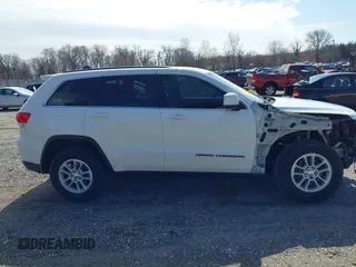 2018 Jeep Grand Cherokee Laredo E with VIN 1C4RJEAG3JC300760, listed as a IAAI auction lot 41811734 with 131,406 mi miles. Bid and sale history available at carsss.com. Image 13.