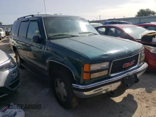 1998 GMC Yukon with VIN 1GKEK13RXWJ723572, listed as a Copart auction lot 65987314 with 237,503 mi miles and Salvage Title. Bid and sale history available at carsss.com. Image 4.