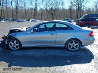 2003 Mercedes-Benz CLK-Class 5.0L with VIN WDBTJ75J03F059702, listed as a IAAI auction lot 41687017 with 185,854 mi miles. Bid and sale history available at carsss.com. Image 14.