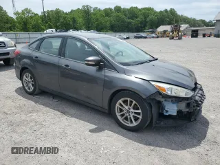 2017 Ford Focus SE with VIN 1FADP3F2XHL201380, listed as a Copart auction lot 56942815 with 136,169 mi miles and Salvage title. Bid and sale history available at DreamBid. Image 4.