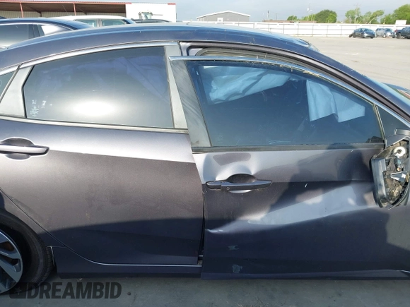 2017 Honda Civic EX z VIN 19XFC2F7XHE056273, wystawiony jako IAAI lot #42087934 z przebiegiem 95 871 mil mil oraz . Historia ofert i sprzedaży dostępna na DreamBid. Obrazek 14.