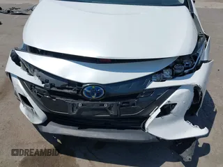 2021 Toyota Prius LE z VIN JTDKAMFP3M3187644, wystawiony jako IAAI lot #42443171 z przebiegiem 126 977 mil mil oraz . Historia ofert i sprzedaży dostępna na DreamBid. Obrazek 6.