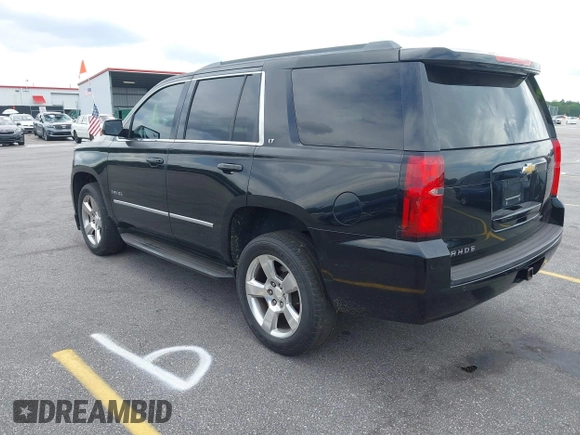 2015 Chevrolet Tahoe LT with VIN 1GNSCBKC4FR145119, listed as a IAAI auction lot 42309931 with 99,408 mi miles and . Bid and sale history available at DreamBid. Image 3.
