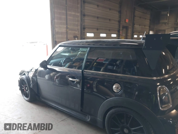 2008 MINI Hardtop S with VIN WMWMF73568TT87273, listed as a IAAI auction lot 41996859 with 107,671 mi miles and . Bid and sale history available at DreamBid. Image 15.